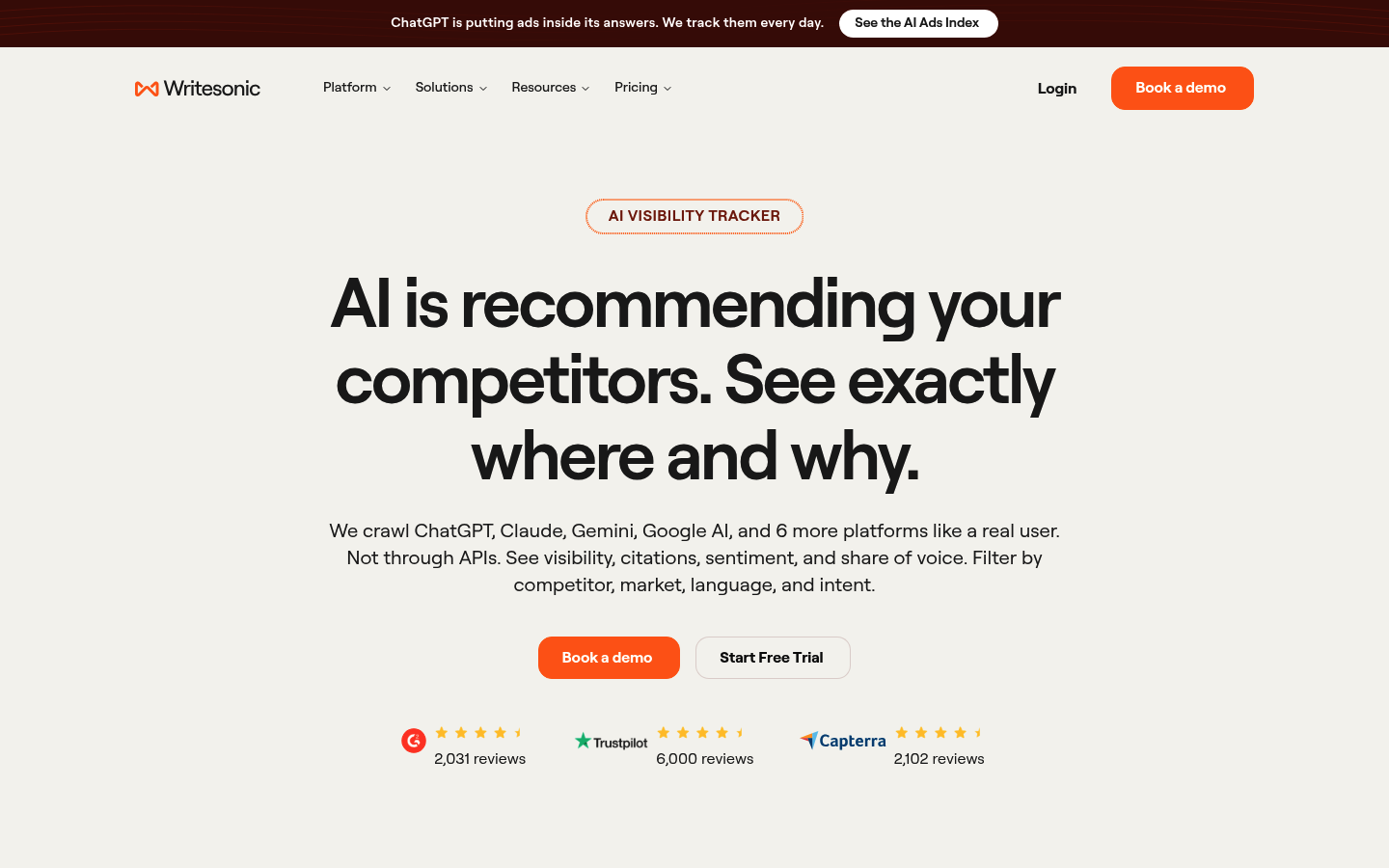 Writesonic AI Visibility Tracker page, AI is recommending your competitors see exactly where and why, with G2, Trustpilot, and Capterra review badges.