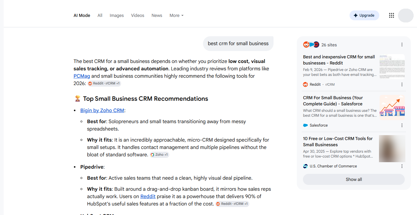 Google AI Mode answering best crm for small business with a structured recommendation list and a sources panel showing 26 sites.